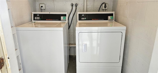 laundry room with washing machine and dryer