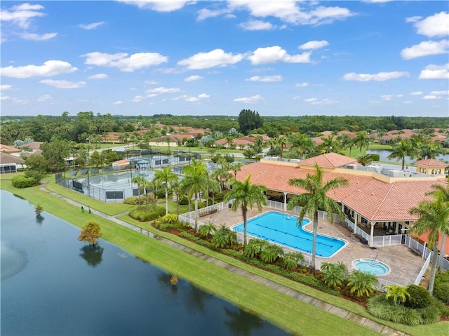 bird's eye view with a residential view and a water view