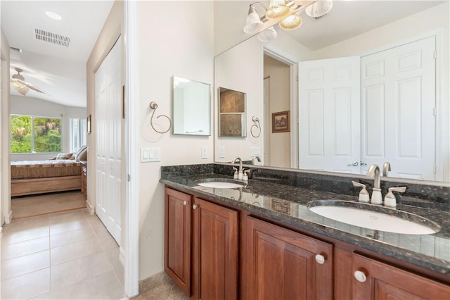 bathroom with ensuite bath, a sink, visible vents, and tile patterned floors