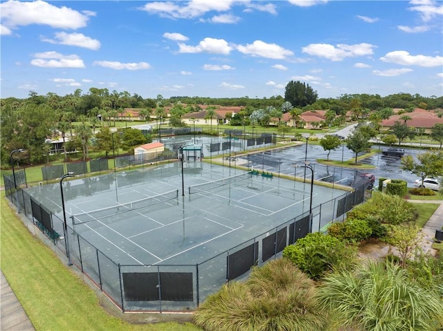 view of sport court featuring a residential view