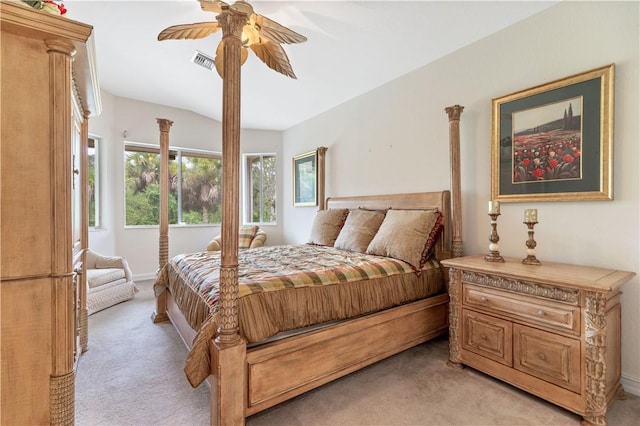 bedroom featuring a ceiling fan, light colored carpet, and visible vents