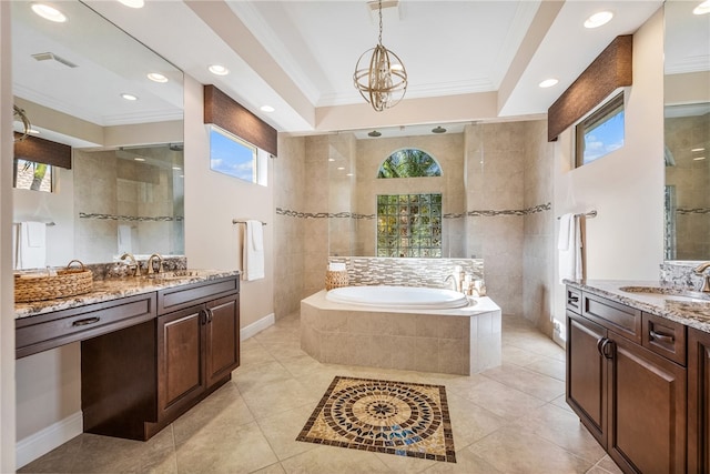 bathroom featuring tile patterned floors, vanity, crown molding, and a chandelier