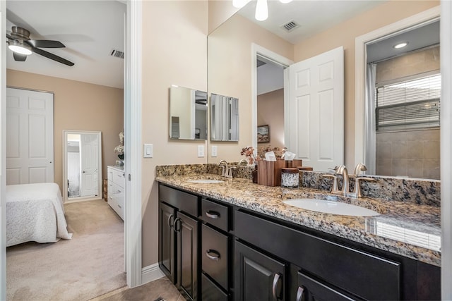 bathroom featuring vanity and ceiling fan