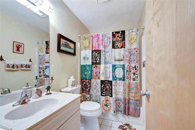 bathroom featuring tile patterned flooring, vanity, and toilet