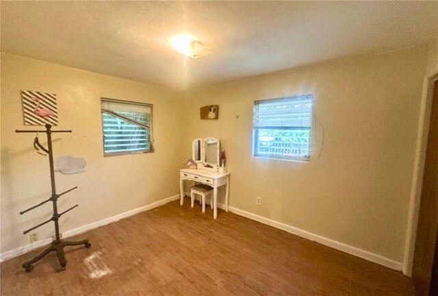 1606 34th Ave, Vero Beach, FL 32960 - miscellaneous room with wood finished floors and baseboards
