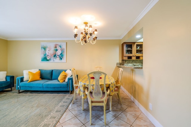 tiled dining room with crown molding and a notable chandelier