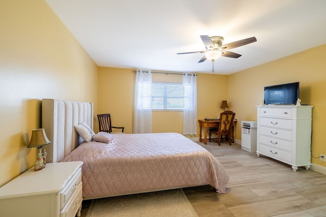 bedroom featuring ceiling fan and light hardwood / wood-style floors