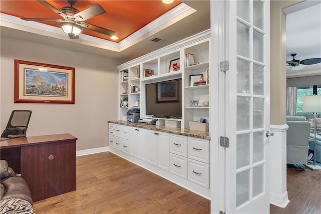 5417 Antigua Cir, Vero Beach, FL 32967 - office area with ceiling fan, ornamental molding, a tray ceiling, wood finished floors, and baseboards
