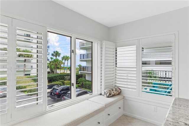 unfurnished room featuring light tile patterned floors