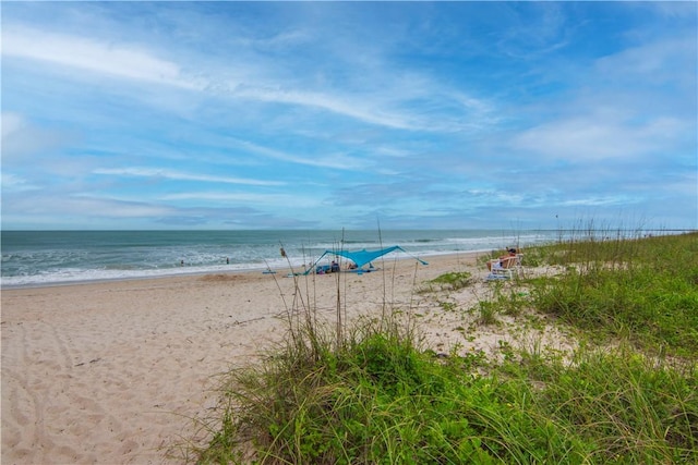 property view of water featuring a view of the beach