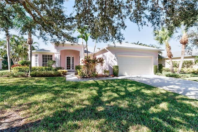 view of front facade featuring a garage and a front yard