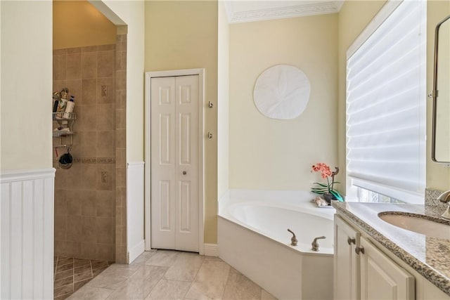 889 Island Club Sq, Vero Beach, FL 32963 - full bath featuring a garden tub, a tile shower, vanity, a closet, and ornamental molding