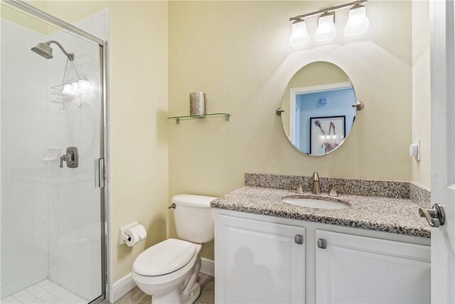 889 Island Club Sq, Vero Beach, FL 32963 - full bath with toilet, vanity, and a stall shower
