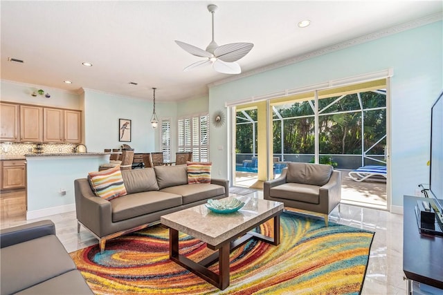 889 Island Club Sq, Vero Beach, FL 32963 - living room featuring a ceiling fan, a sunroom, recessed lighting, and crown molding