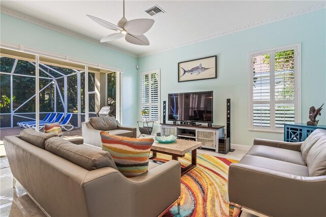 889 Island Club Sq, Vero Beach, FL 32963 - living room with ceiling fan, a sunroom, baseboards, and crown molding
