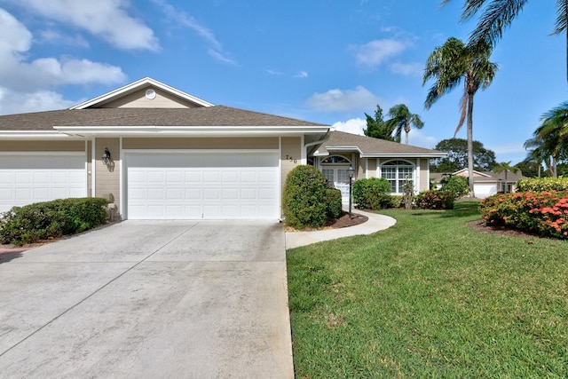 single story home with a front lawn and a garage