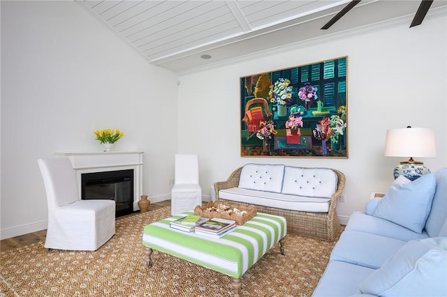40 White Orchid Way, Vero Beach, FL 32963 - living area featuring a glass covered fireplace, wooden ceiling, baseboards, and wood finished floors