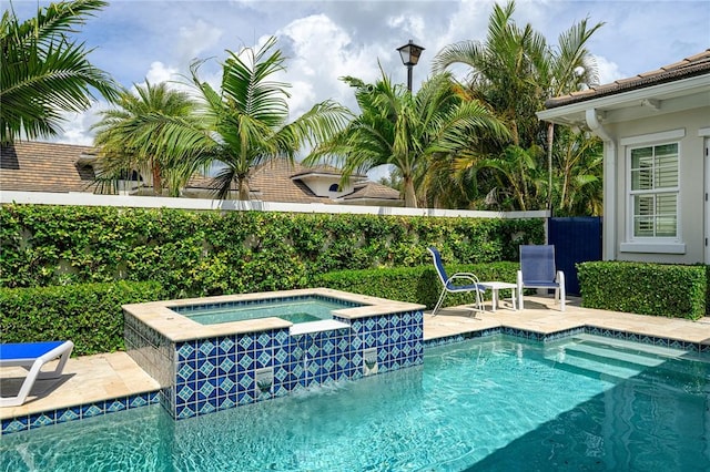 40 White Orchid Way, Vero Beach, FL 32963 - view of pool with a fenced backyard, a pool with connected hot tub, and a patio area