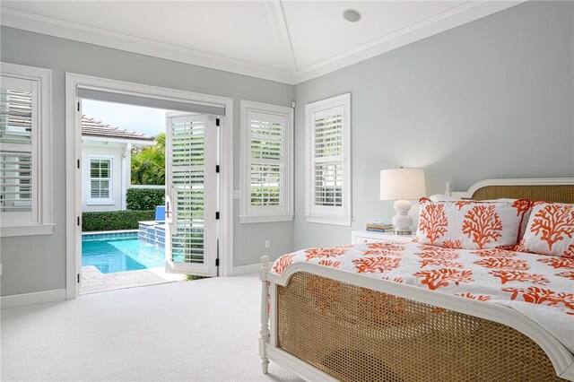 40 White Orchid Way, Vero Beach, FL 32963 - bedroom featuring baseboards, access to outside, carpet, vaulted ceiling, and ornamental molding