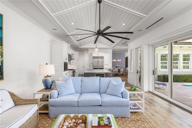 40 White Orchid Way, Vero Beach, FL 32963 - living area with light wood-style floors, a ceiling fan, recessed lighting, and wood ceiling