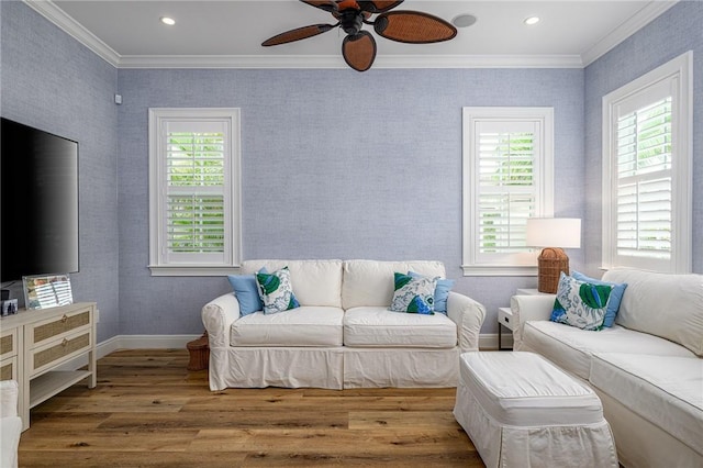 40 White Orchid Way, Vero Beach, FL 32963 - living room featuring ornamental molding, wood finished floors, a ceiling fan, baseboards, and recessed lighting