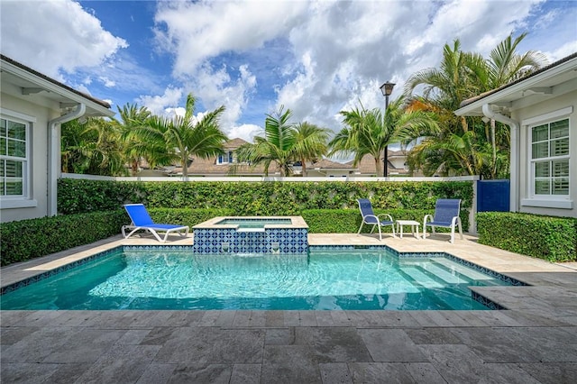 40 White Orchid Way, Vero Beach, FL 32963 - view of pool featuring a patio and a pool with connected hot tub