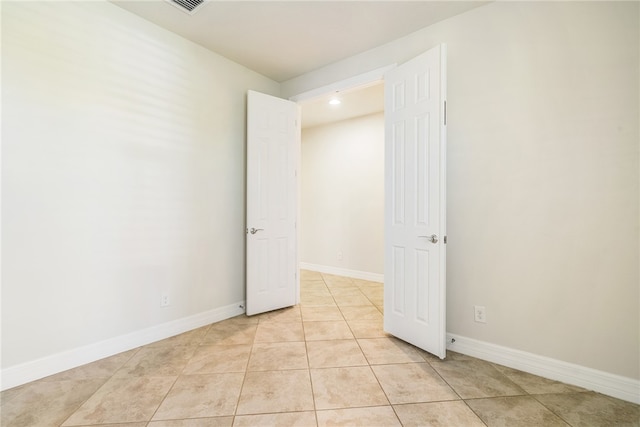 view of tiled spare room