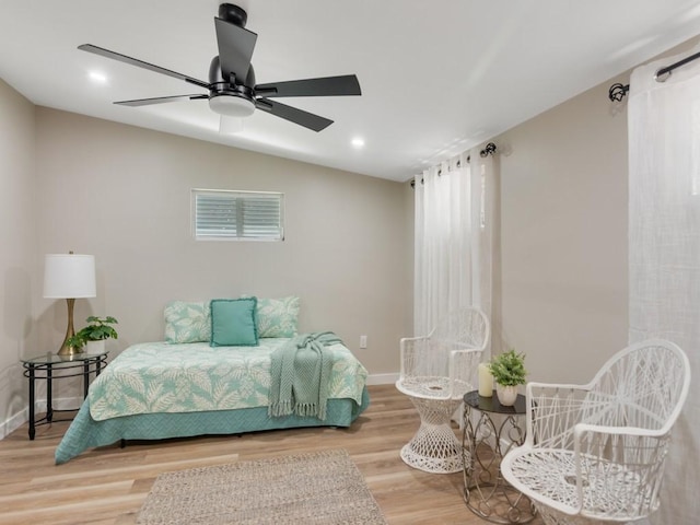 bedroom featuring light wood-style floors, baseboards, a ceiling fan, and recessed lighting