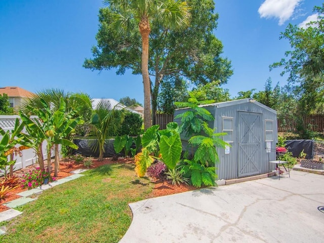view of shed with fence