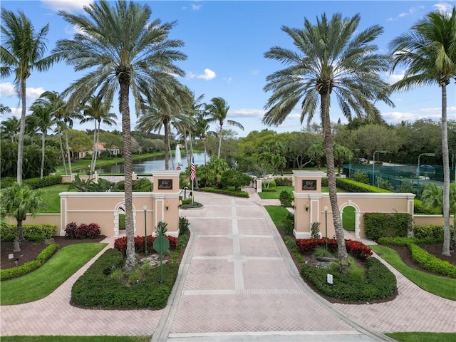 surrounding community featuring a water view