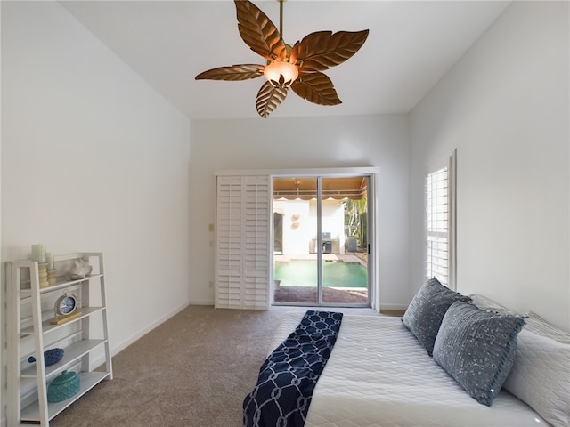 bedroom featuring access to exterior, light colored carpet, ceiling fan, and baseboards