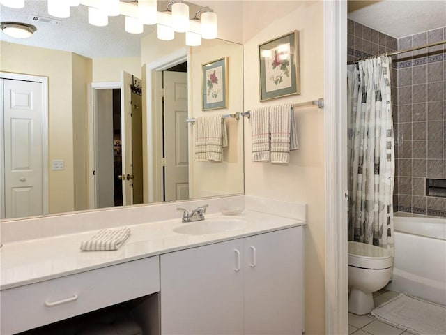 full bathroom with vanity, tile patterned flooring, shower / bath combination with curtain, and toilet