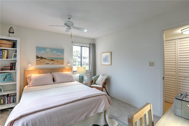 bedroom with a closet and ceiling fan