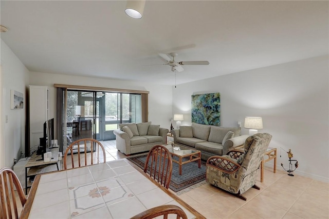 tiled living room with ceiling fan