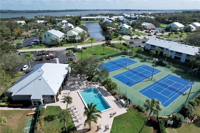 bird's eye view with a water view