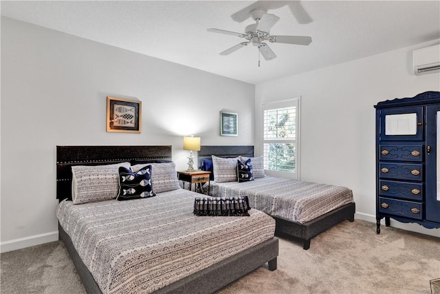 bedroom with a wall unit AC, light colored carpet, and ceiling fan