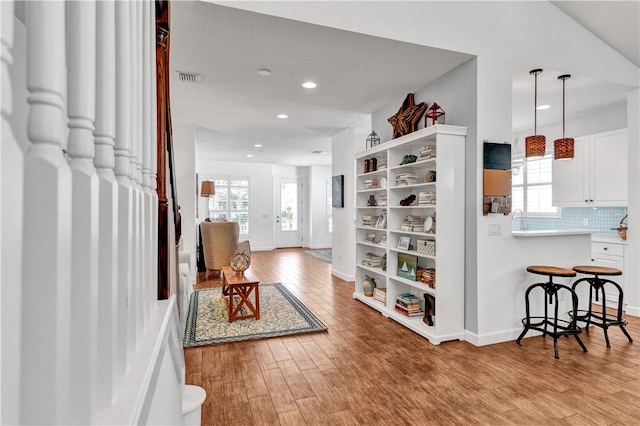 entryway with light hardwood / wood-style flooring