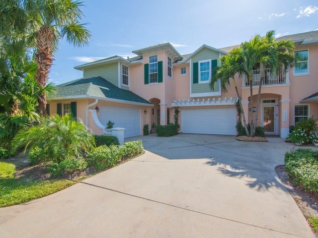 view of front of property with a garage