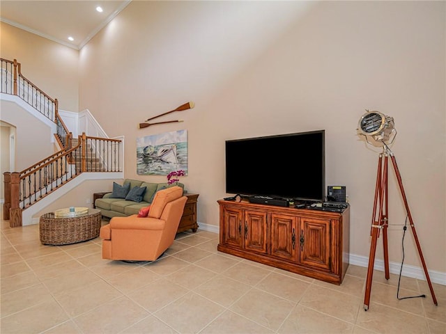 4570 Bridgepointe Way Unit 148, Vero Beach, FL 32967 - living area with a high ceiling, ornamental molding, stairs, light tile patterned floors, and recessed lighting