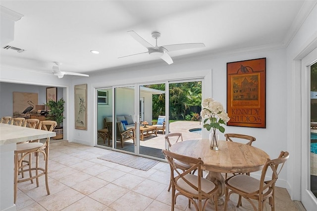 976 25th St, Vero Beach, FL 32960 - dining area featuring ceiling fan, ornamental molding, light tile patterned flooring, french doors, and recessed lighting