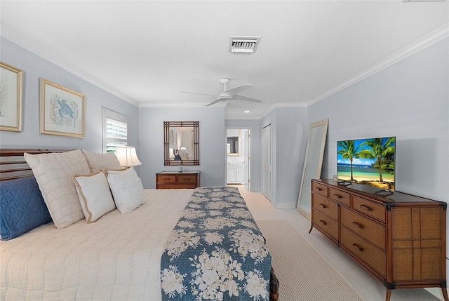 976 25th St, Vero Beach, FL 32960 - bedroom with ornamental molding, ensuite bath, a ceiling fan, and a closet
