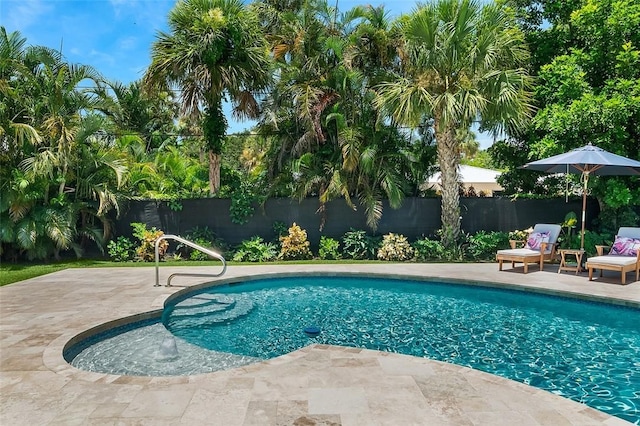976 25th St, Vero Beach, FL 32960 - view of swimming pool featuring a fenced backyard and a patio area