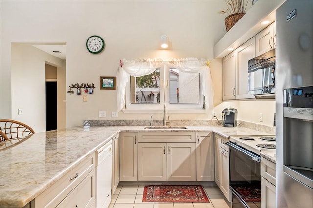 kitchen featuring sink, dishwasher, range with electric stovetop, stainless steel fridge with ice dispenser, and kitchen peninsula