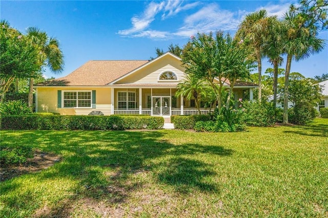 ranch-style house featuring a front yard