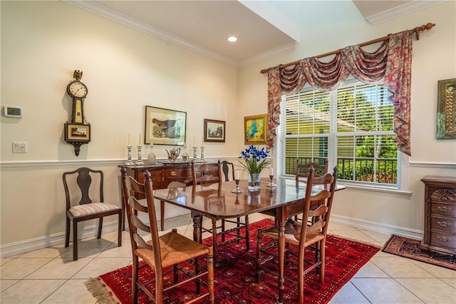 dining area featuring light tile patterned floors, baseboards, crown molding, and recessed lighting