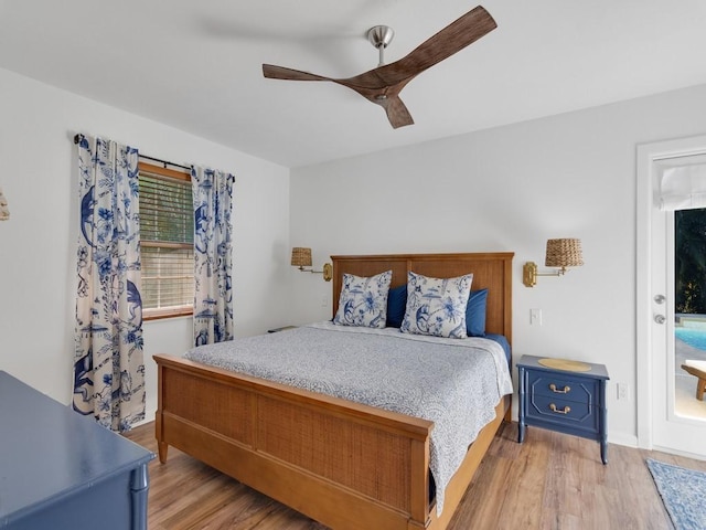 bedroom with ceiling fan and light hardwood / wood-style flooring