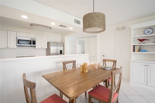 view of tiled dining space