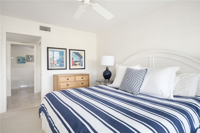 carpeted bedroom featuring connected bathroom and ceiling fan