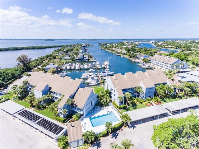 drone / aerial view with a water view