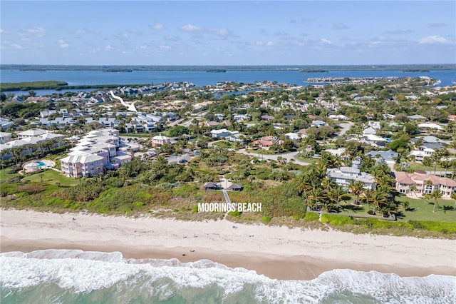 aerial view with a view of the beach and a water view